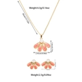 Detailed view of pink floral enamel jewelry set with pearl centers and gold plating - Red Flower Style (TZ53)