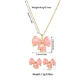Detailed size chart for pink bow jewelry set showing titanium steel necklace and earrings - Bowknot Style (TZ57) [Pink]