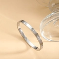 Polished stainless steel bangle with clover patterns and inset crystals for women - Steel Style (SZ-011-2)