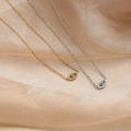 Elegant gold and silver evil eye pendant necklaces with pavé crystals on satin - Pave Rhinestone Evil Eye Style