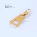 Dettaglio macro del tiretto per cerniera in acciaio inossidabile placcato oro 18k - Stile Grande / Oro
