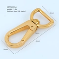 Detalles y medidas del cierre de mosquetón giratorio de acero inoxidable bañado en oro 18k - Dorado 46mm x 22mm