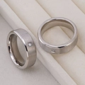 Brushed silver titanium ring with a square-cut zircon stone in a beige jewelry slot - US 7 / Silver