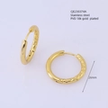 Detail of 26mm stainless steel gold plated earrings with hammered and polished texture - Extra Large / Gold