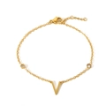 Detail of 18K gold stainless steel chain featuring V pendant and two round zircons - Letter V / Gold
