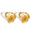 Macro detail of high-polish gold 18k plated floral drop earrings in stainless steel - Flower Shape (E633) / Gold