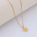 Gold stainless steel Taurus zodiac necklace featuring a circular hollow pendant on a chain - Taurus (With Chain) / Gold