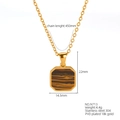 Detail view of 18k gold plated octagonal pendant showing 22mm by 14.5mm dimensions - Tiger Eye Style (E713-Gold+Cross Chain)