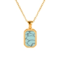 Dettaglio di una collana a catena dorata con pendente ottagonale in pietra turchese - Turchese (Placcato Oro)