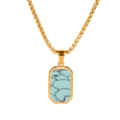 Macro detail of gold-plated box chain with turquoise stone inlay on a square pendant - Gold / Blue Turquoise