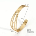 Layered open-style hollow cuff bangle in 18k gold plated PVD stainless steel finish - Multi Line Hollow Intertwined Style (B679-03)