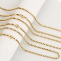 Goldene Edelstahl-Venezianerketten mit Karabinerverschluss auf weißem Display - 60CM / Goldene Box-Kette
