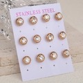 Classic rose gold stainless steel round stud earrings with crystals on white display card - Rose Gold