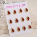 Set of 6 pairs golden stainless steel teardrop earrings with red gems and crystal halos - Red Gold Tone