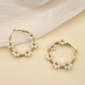 White handmade beaded flower hoop earrings in gold finish for a fresh summer look - Ivory