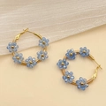 Handmade light blue crystal flower beaded gold hoop earrings in a sweet floral design - Light Blue