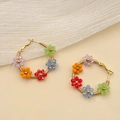 Colorful crystal flower hoop earrings with gold frame and handmade beaded design - Colorful