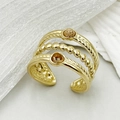 Détail de bague en acier inoxydable 18K avec pierre turquoise et textures torsadées - Marron