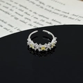 Close-up of elegant silver open ring with star leaf yellow zircon stones detail - Yellow White Zirconia Star Leaf Style (JZ2933A)