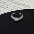 Macro detail of silver ring with zircon flower pattern and double row pavé setting - Micro Zirconia Flower Double Row Pave Style (JZ4093A)