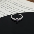 Macro shot of silver ring with purple heart gem, side diamonds and twisted band details - Purple Heart Twisted Rope Texture Style (JZ4693A)