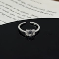 Macro shot of silver adjustable ring with oval gemstone and twisted rope texture design - Oval Main Stone Twisted Rope Style (JZ5382A)