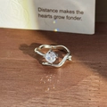Macro detail of wave-shaped S925 silver ring with sparkling zircon and S925 engraving - Wave Round Zircon Style (JZ2053) / Silver