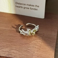Detail of silver adjustable ring with olive green gemstone butterflies on a wood base - Olive Green Gem Butterfly Style (JZ2197A) / Silver