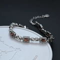 Vintage style bracelet with oval red zircons and sparkling micro-pave white stones - Red Zirconia Cross Style (SL0085 Orange)