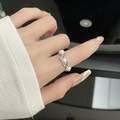 Minimalist silver ring with three pearls on a model hand with elegant nail art - Triple Pearl Stacked Luxury Style (JZ1320)