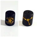 Macro view of matte black glass beads with golden Cancer zodiac and star map patterns - 10*14mm / Cancer Double Sided Gold Pattern