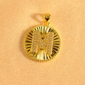 Macro shot of gold-plated sunburst pendant featuring an iced-out crystal letter M detail - Letter M / Gold