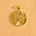 Macro detail of gold-plated sunburst pendant featuring crystal-encrusted letter N - Letter N / Gold