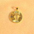 Detail showing gold-plated circular pendant with sunburst texture and pavé zircon letter T - Letter T / Gold