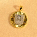Macro detail of gold-plated sunburst pendant with crystal-encrusted letter U charm - Letter U / Gold