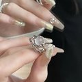 Close-up of moonstone ring with irregular liquid metal texture on finger - Irregular Moonstone Style (JZ1309) / Silver