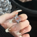 Elegant heart-shaped moonstone ring with sparkling crown details on hand - Adjustable Open / Crown Design Heart Ring (JZ1762)