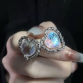 Moonstone heart earrings with silver braided texture frame and iridescent gemstone glow - Silver Liquid Metal Frame Iridescent Heart Style (JZ1810)