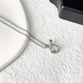 Minimalist silver rabbit necklace with moonstone pendant on white textured background - Colorful Faceted Rabbit Style (JZ2098)