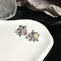 Artistic silver fluid rabbit earrings with iridescent moonstone beads on display - Iridescent White (JZ2166)