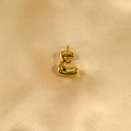 Polished gold bubble letter E pendant in a minimalist 3D style on silk fabric - Letter E / Gold