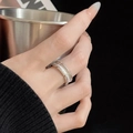 Macro detail of silver wide band ring featuring intricate textured finish and beaded edges - Adjustable Open / Wide Woven Brushed Beaded Edge Style (JZ5006) / Silver