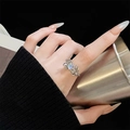 Macro detail of irregular textured silver ring featuring a round moonstone on finger - Adjustable Open / Lava Irregular Texture Style (JZ4945) / Silver