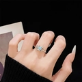 Detail of silver textured ring featuring a heart-shaped opal and celestial pearl accents - Adjustable Open / Planet Heart Stone Style (JZ4646) / Silver