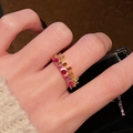 Detail of colorful gemstone ring with gold finish and mixed-cut zircons on hand - Multi-color Gem Cluster (JZ5873)
