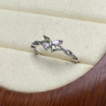Detailed macro of butterfly ring with purple and olive green marquise gemstones - Purple and Green Butterfly Style (JZ1773A)