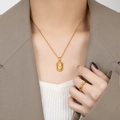 Golden frosted Buddha head necklace and geometric beaded ring jewelry set on model - Small Buddha Head Gold Style (XL0114)