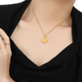 24K gold plated Gemini zodiac coin necklace with minimalist ring on female model - Gemini / Gold