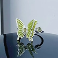 Detail of green enamel butterfly ring with olive green gemstones on polished silver band - Adjustable Open / Green Enamel Butterfly Style (JZ6210)