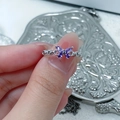 Nahaufnahme des lila Zirkonia-Schmetterlings und des hohlen Ketten-Silberringbands - Marquise-Schmetterlings-Stil (JZ0192A)